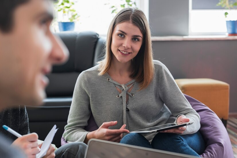 a life coach talking to a client