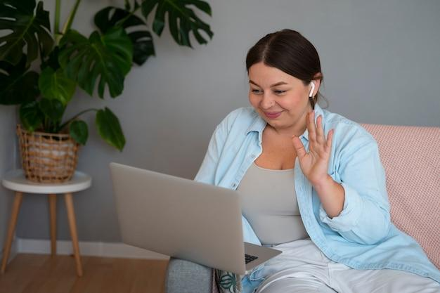 woman having a call on a laptop